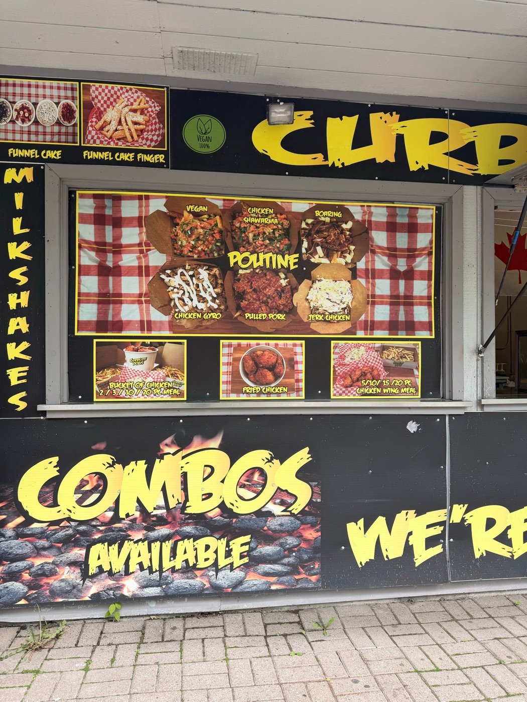 Curbsidedogs menu board at an event stand