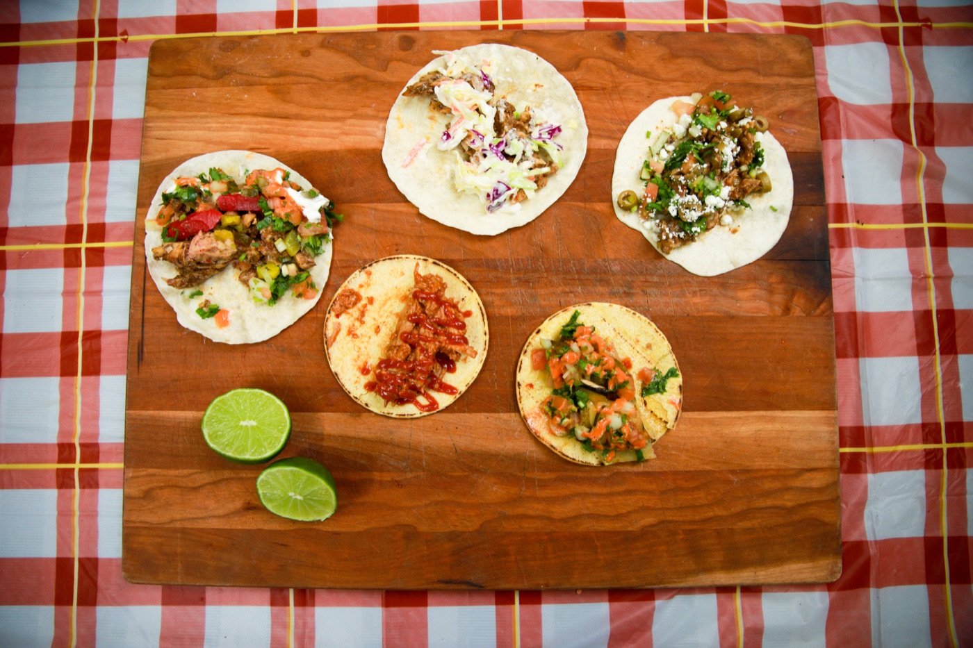 Assorted street tacos with lime