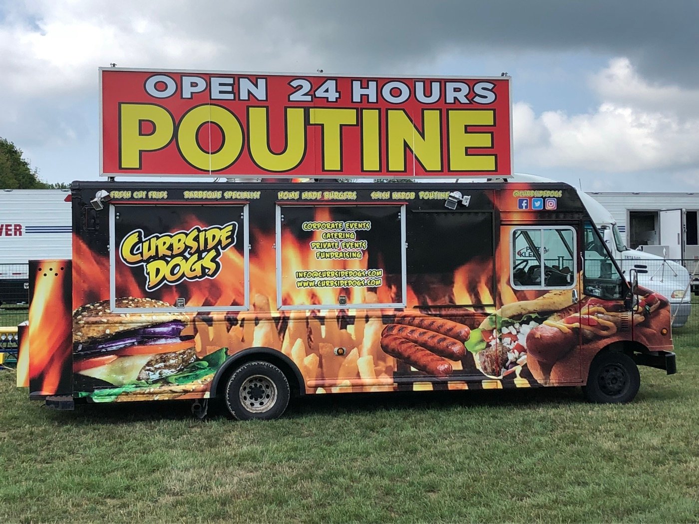 Curbsidedogs food truck parked at an event